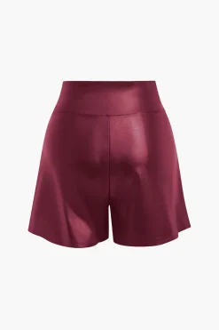 Solid Faux Leather Asymmetrical Zipper Shorts